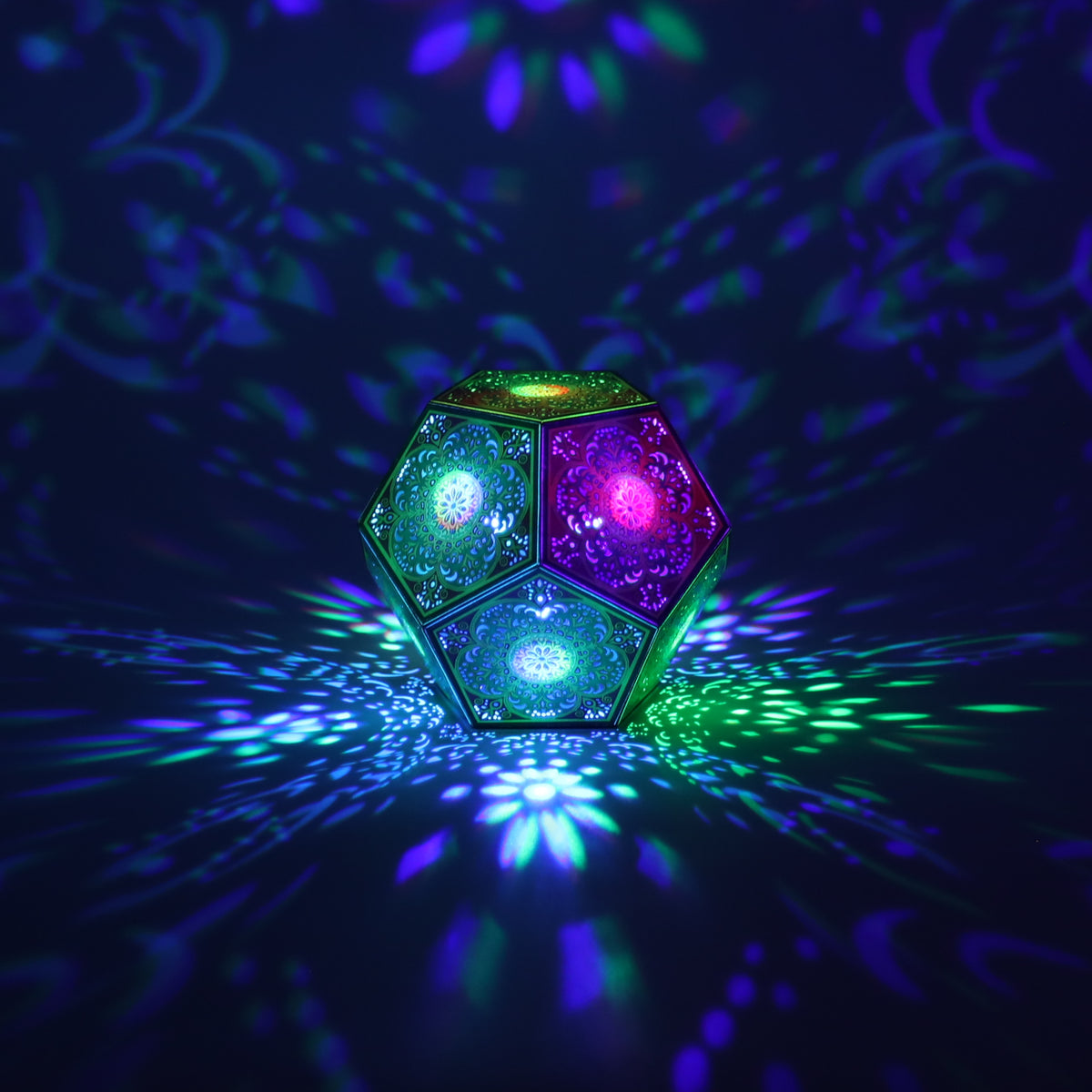 MikhaLuma Logos dodecahedron lantern in Shadow Caster style, casting geometric light patterns across a dark room