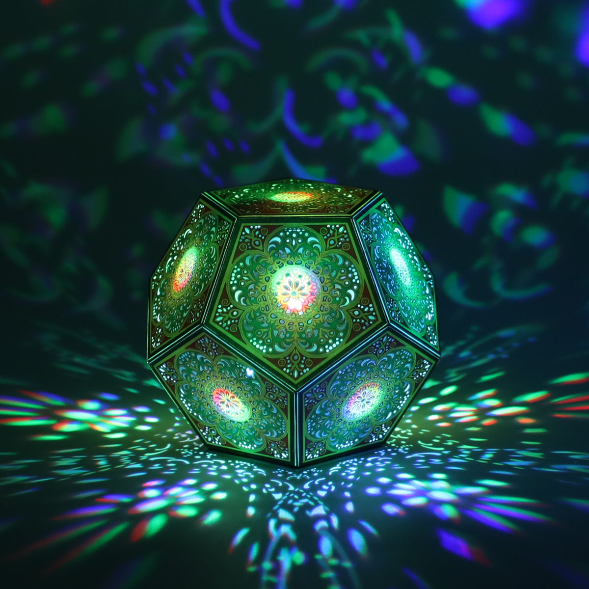 MikhaLuma Logos dodecahedron lantern in Shadow Caster style, casting geometric light patterns across a dark room