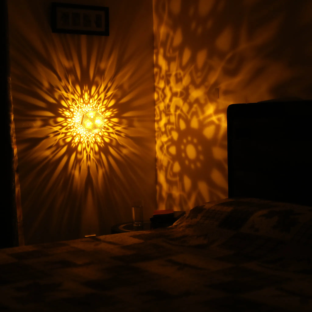 MikhaLuma Telos dodecahedron lantern in Amber style, warm amber light wrapping a wall corner