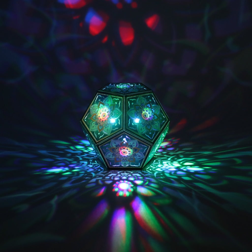 MikhaLuma Telos dodecahedron lantern in Shadow Caster style, casting geometric light patterns across a dark room