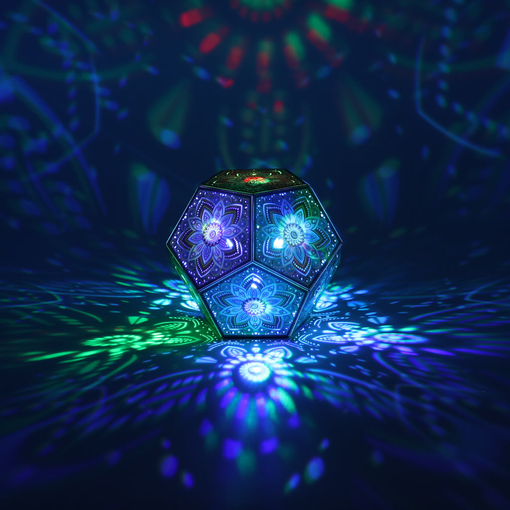 MikhaLuma Xenia dodecahedron lantern in Shadow Caster style, casting geometric light patterns across a dark room