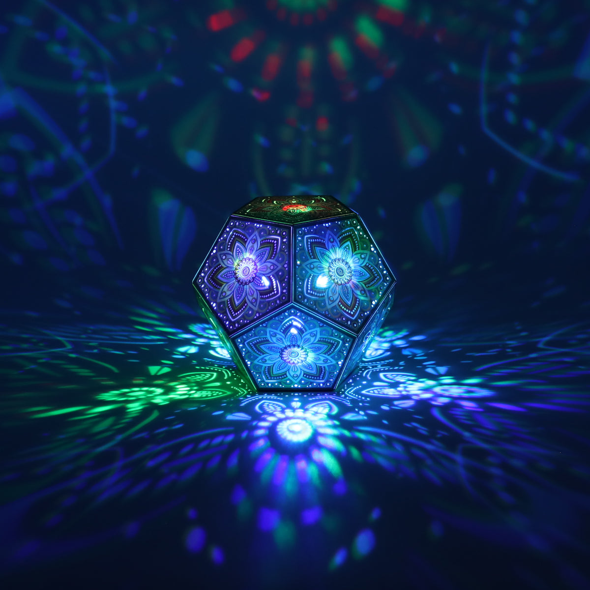 MikhaLuma Xenia dodecahedron lantern in Shadow Caster style, casting geometric light patterns across a dark room