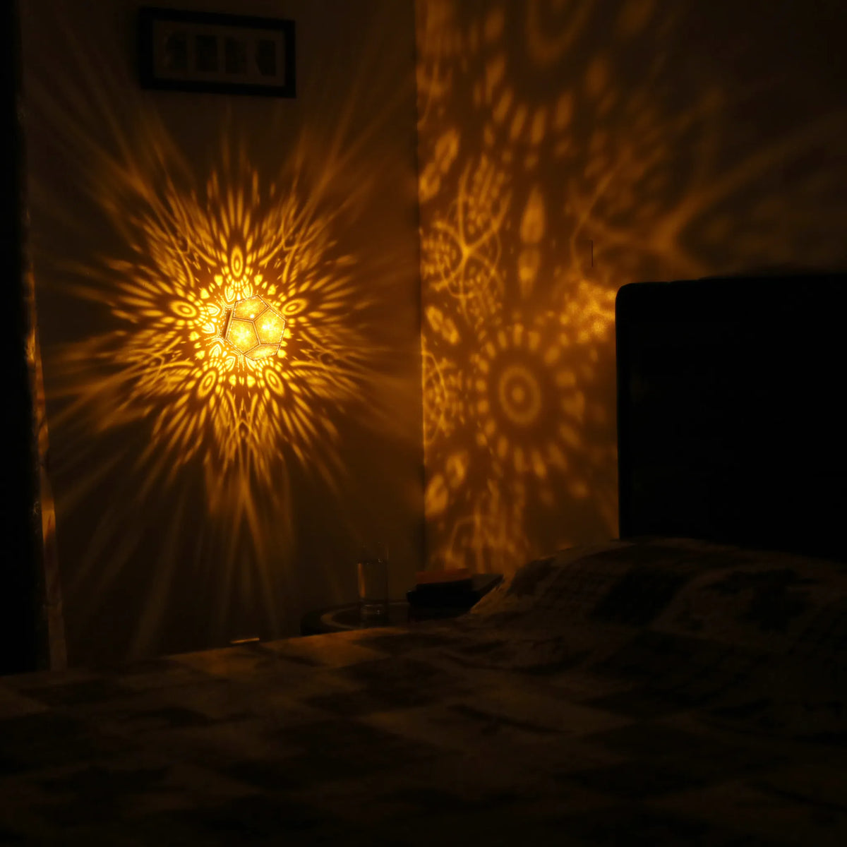 MikhaLuma Storge dodecahedron lantern in Amber style, warm amber light wrapping a wall corner