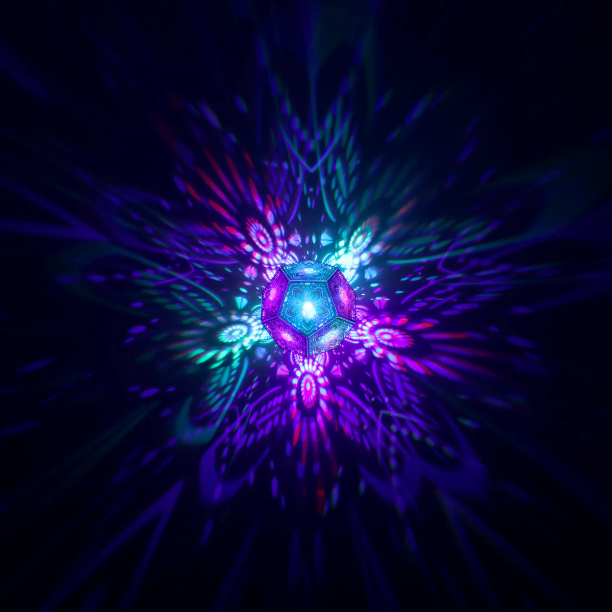 MikhaLuma Storge dodecahedron lantern in Shadow Caster style, geometric pattern projected across a wall