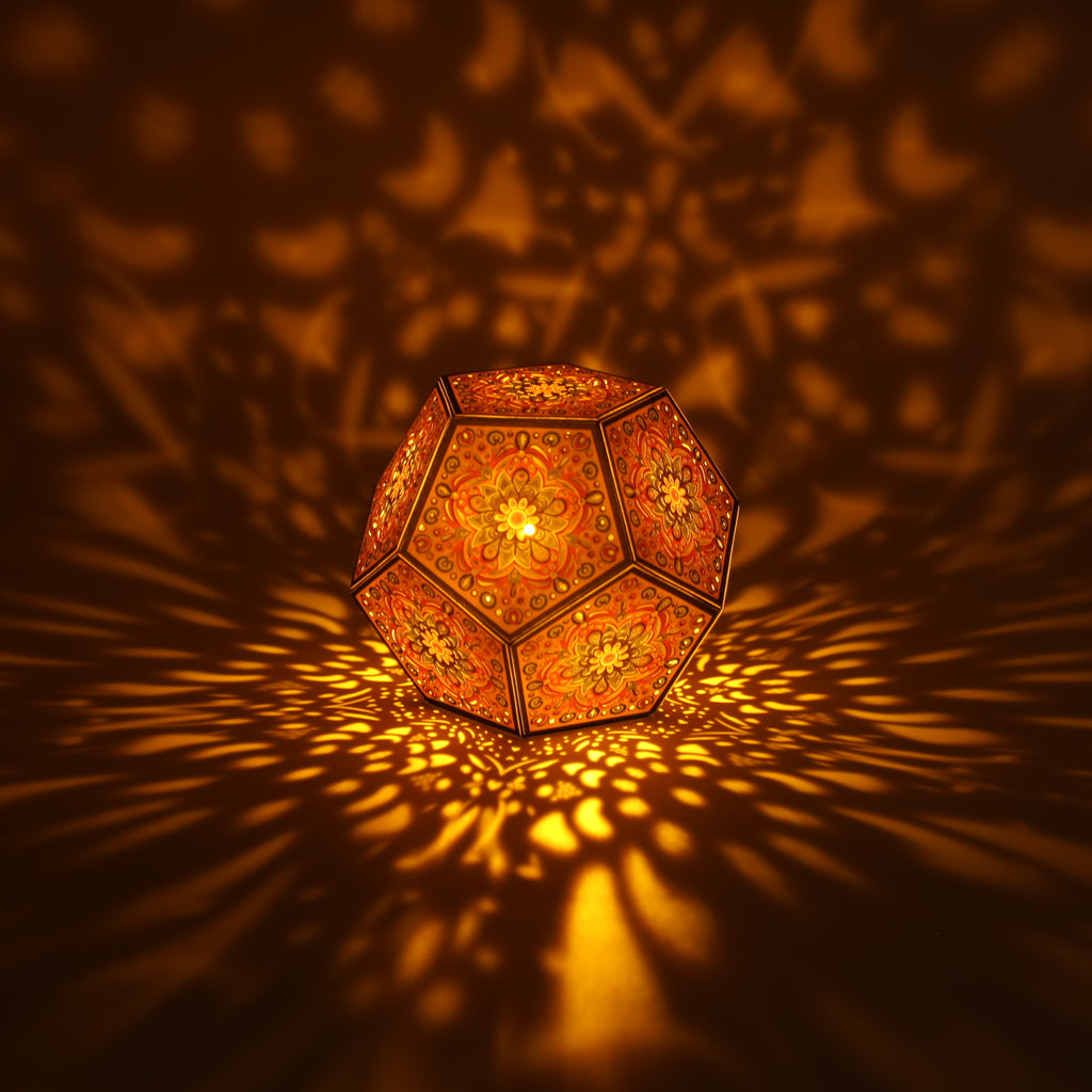 MikhaLuma Eunoia dodecahedron lantern in Amber style, lit with a warm amber tone