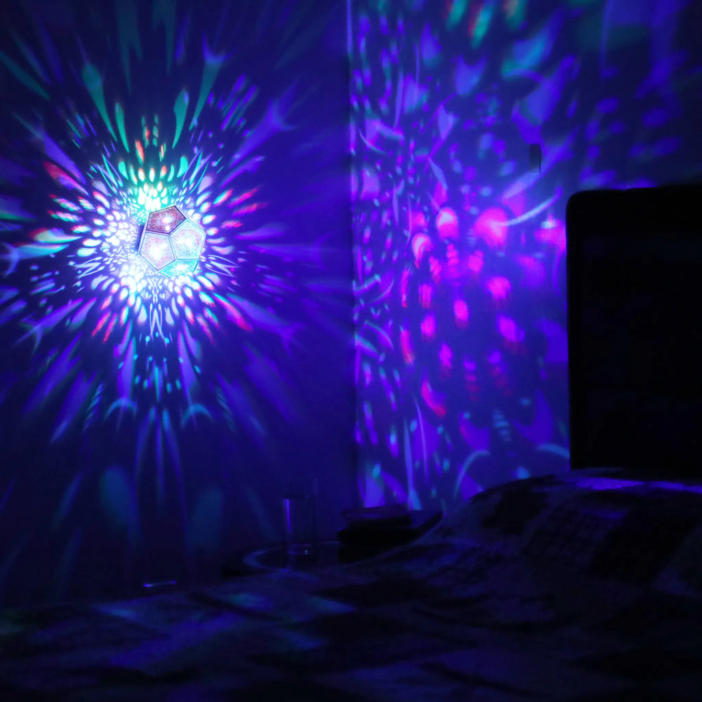 MikhaLuma Eunoia dodecahedron lantern in Shadow Caster style, projected pattern wrapping a wall corner