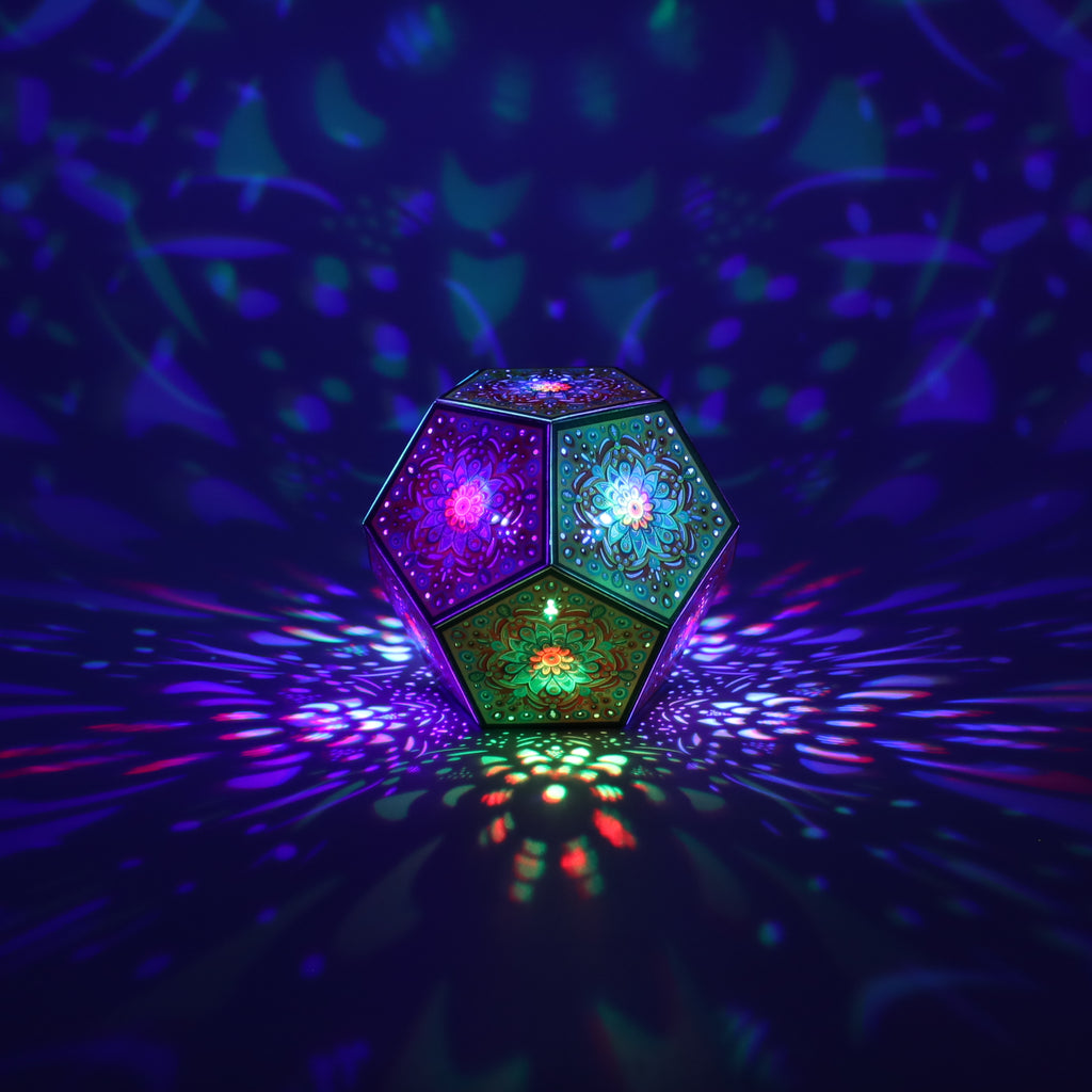 MikhaLuma Eunoia dodecahedron lantern in Shadow Caster style, casting geometric light patterns across a dark room