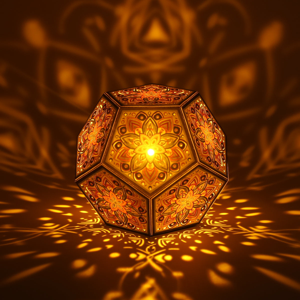 MikhaLuma Philia dodecahedron lantern in Amber style, lit with a warm amber tone