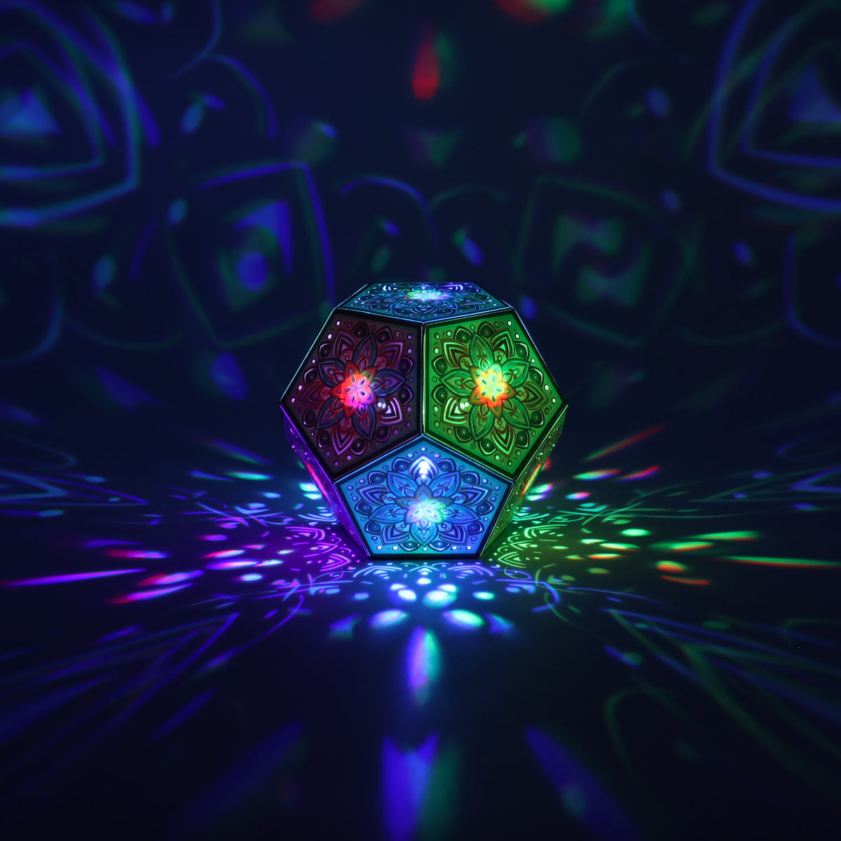 MikhaLuma Philia dodecahedron lantern in Shadow Caster style, casting geometric light patterns across a dark room