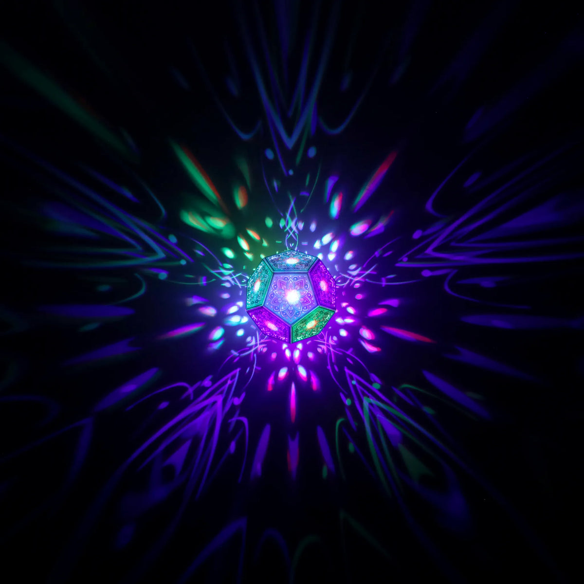 MikhaLuma Philia dodecahedron lantern in Shadow Caster style, geometric pattern projected across a wall
