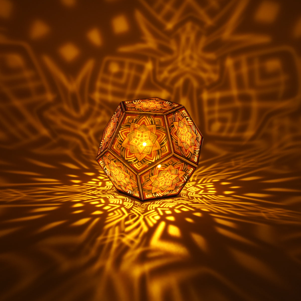 MikhaLuma Arete dodecahedron lantern in Amber style, lit with a warm amber tone