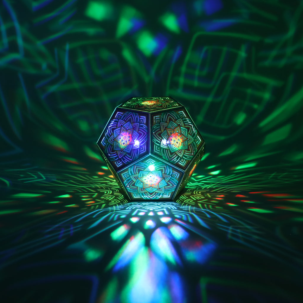 MikhaLuma Arete dodecahedron lantern in Shadow Caster style, casting geometric light patterns across a dark room