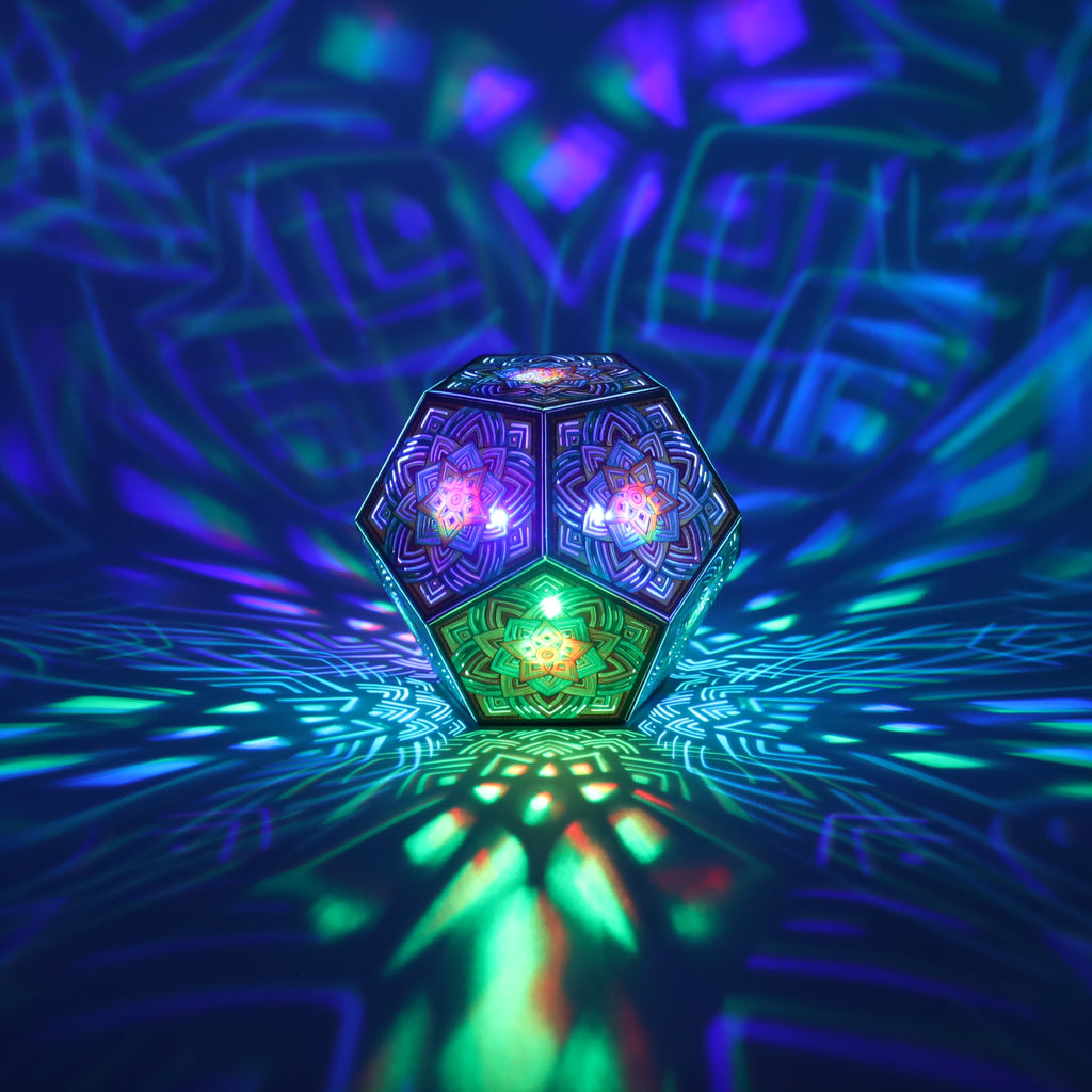 MikhaLuma Arete dodecahedron lantern in Shadow Caster style, casting geometric light patterns across a dark room