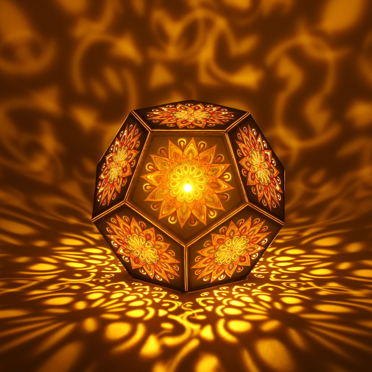 MikhaLuma Episteme dodecahedron lantern in Amber style, lit with a warm amber tone