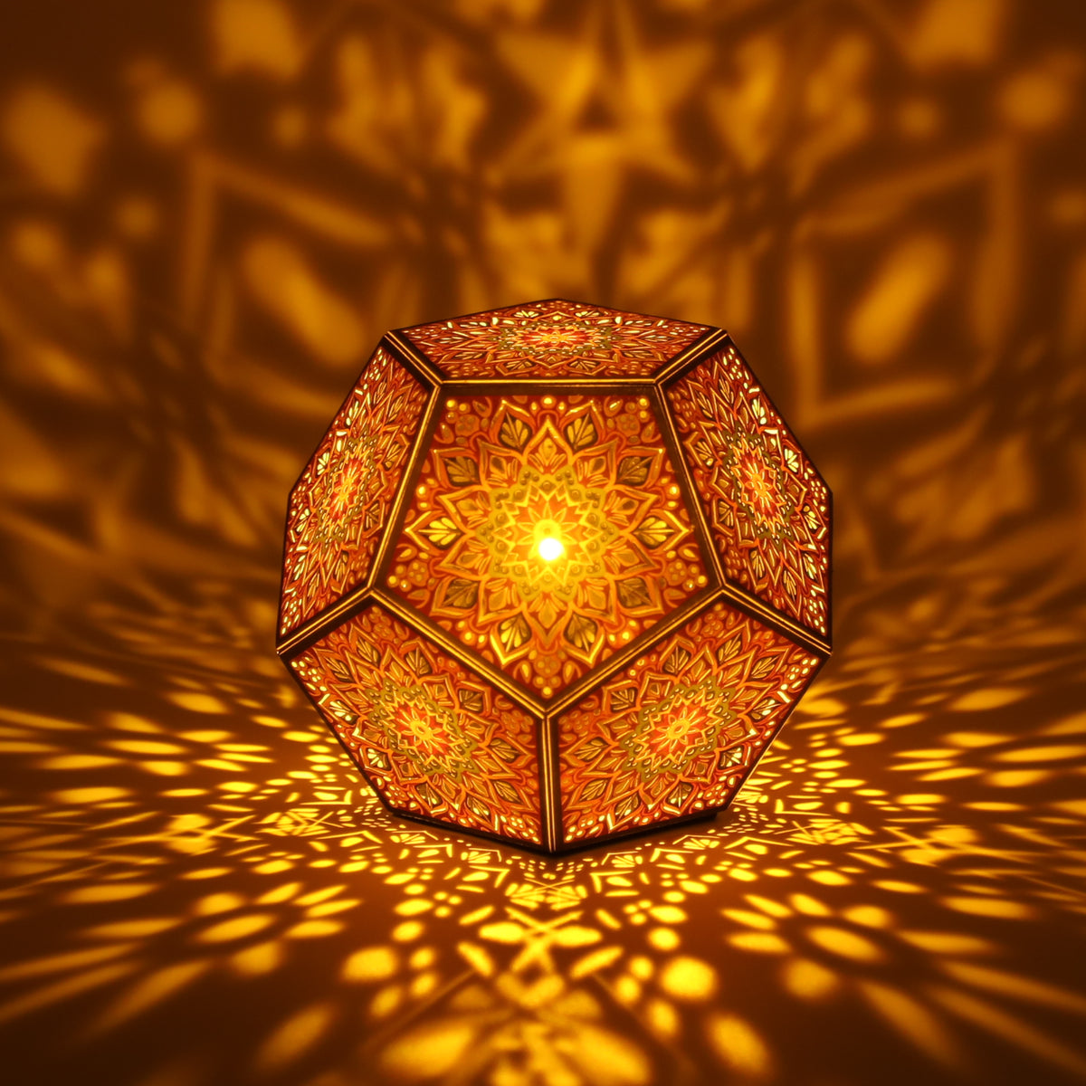 MikhaLuma Eudaimonia dodecahedron lantern in Amber style, lit with a warm amber tone