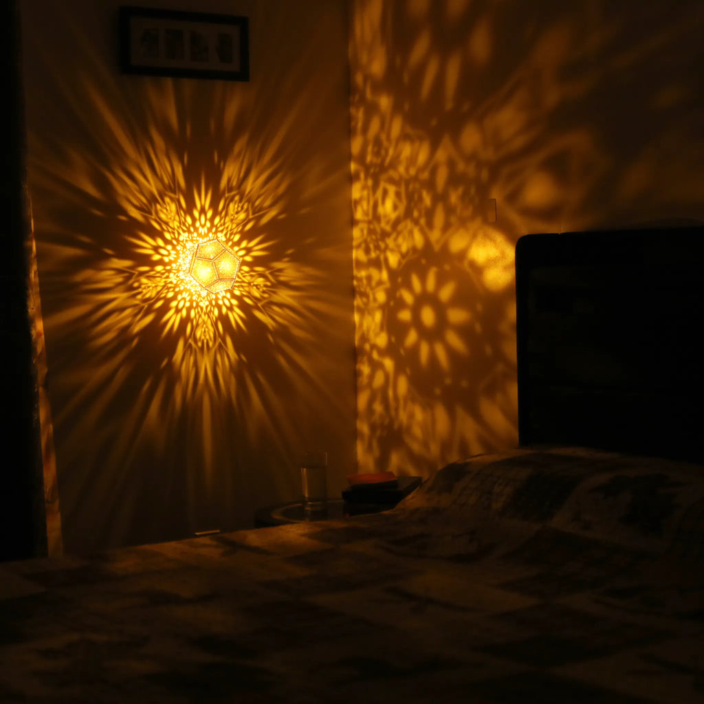 MikhaLuma Eudaimonia dodecahedron lantern in Amber style, warm amber light wrapping a wall corner