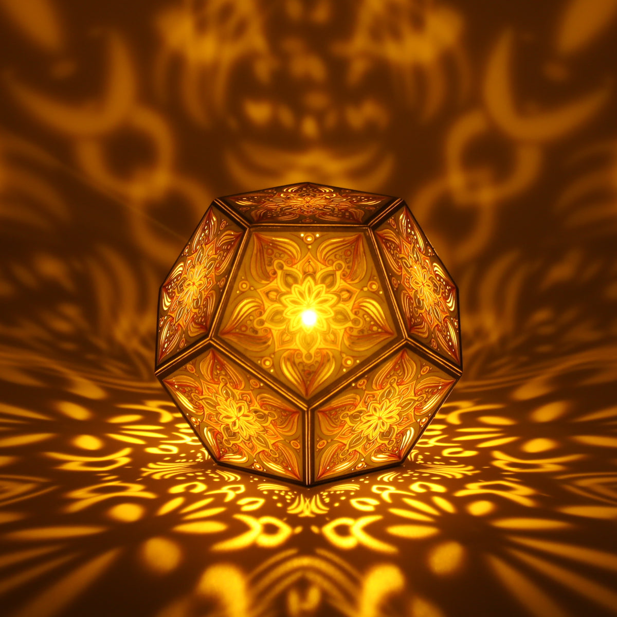 MikhaLuma Ataraxia dodecahedron lantern in Amber style, lit with a warm amber tone