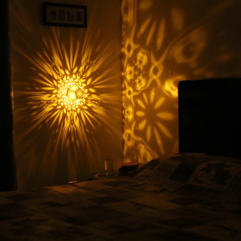 MikhaLuma Ataraxia dodecahedron lantern in Amber style, warm amber light wrapping a wall corner