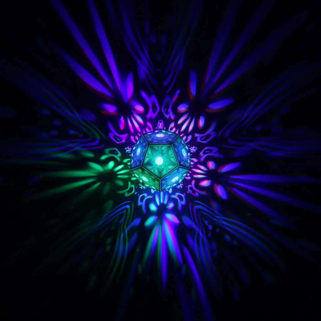 MikhaLuma Ataraxia dodecahedron lantern in Shadow Caster style, geometric pattern projected across a wall
