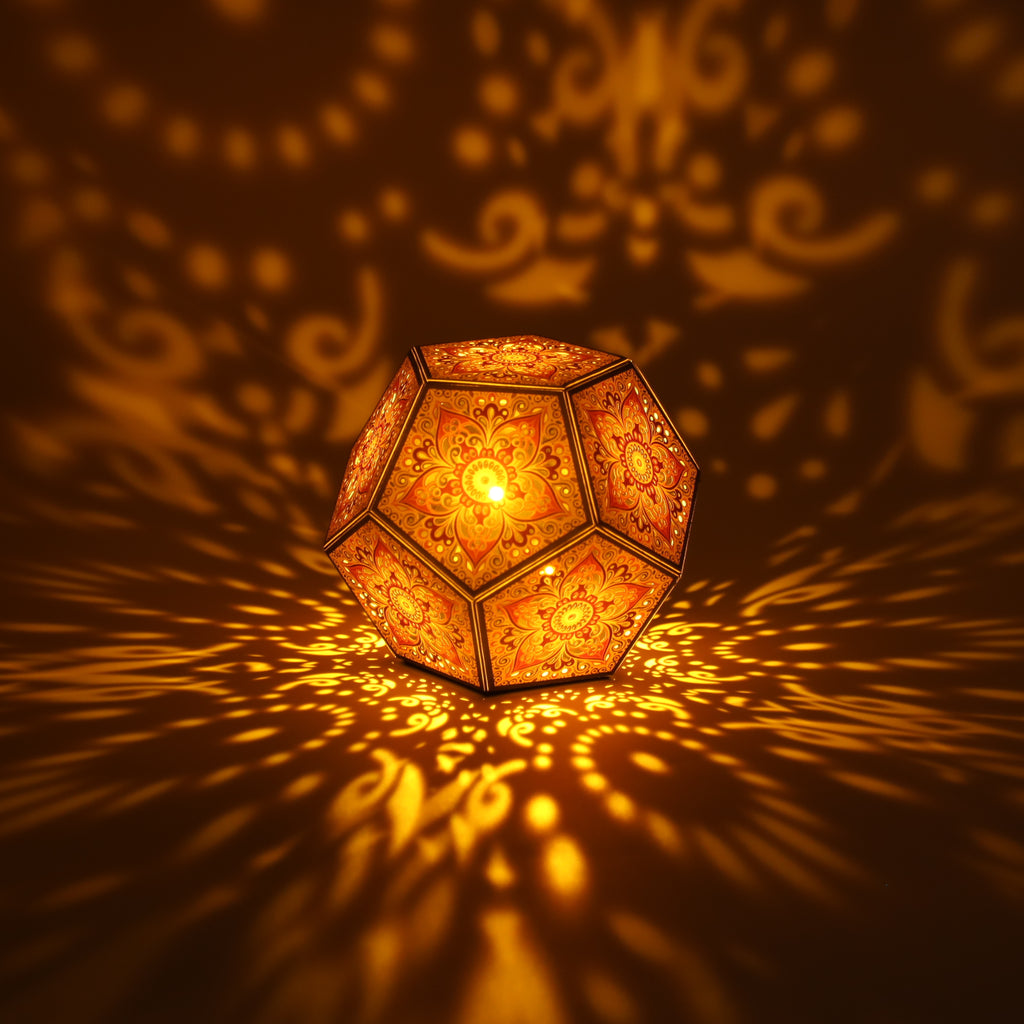 MikhaLuma Aletheia dodecahedron lantern in Amber style, lit with a warm amber tone