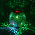 MikhaLuma Aletheia dodecahedron lantern in Shadow Caster style, casting geometric light patterns across a dark room