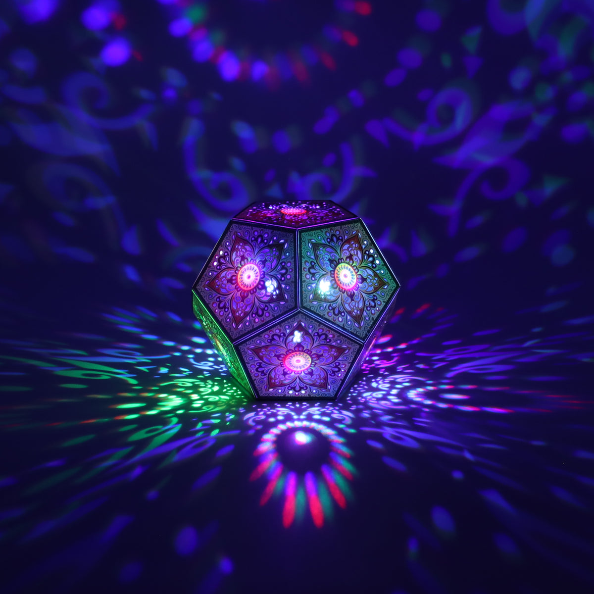 MikhaLuma Aletheia dodecahedron lantern in Shadow Caster style, casting geometric light patterns across a dark room