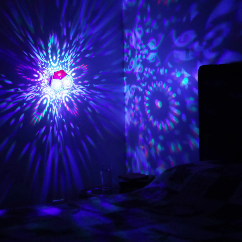 MikhaLuma Aletheia dodecahedron lantern in Shadow Caster style, projected pattern wrapping a wall corner