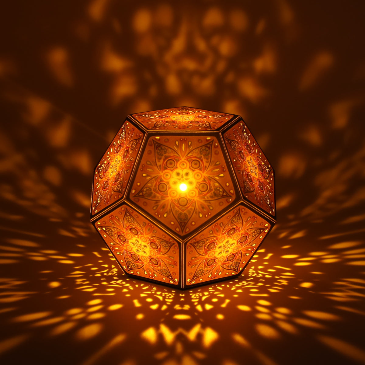 MikhaLuma Phronesis dodecahedron lantern in Amber style, lit with a warm amber tone