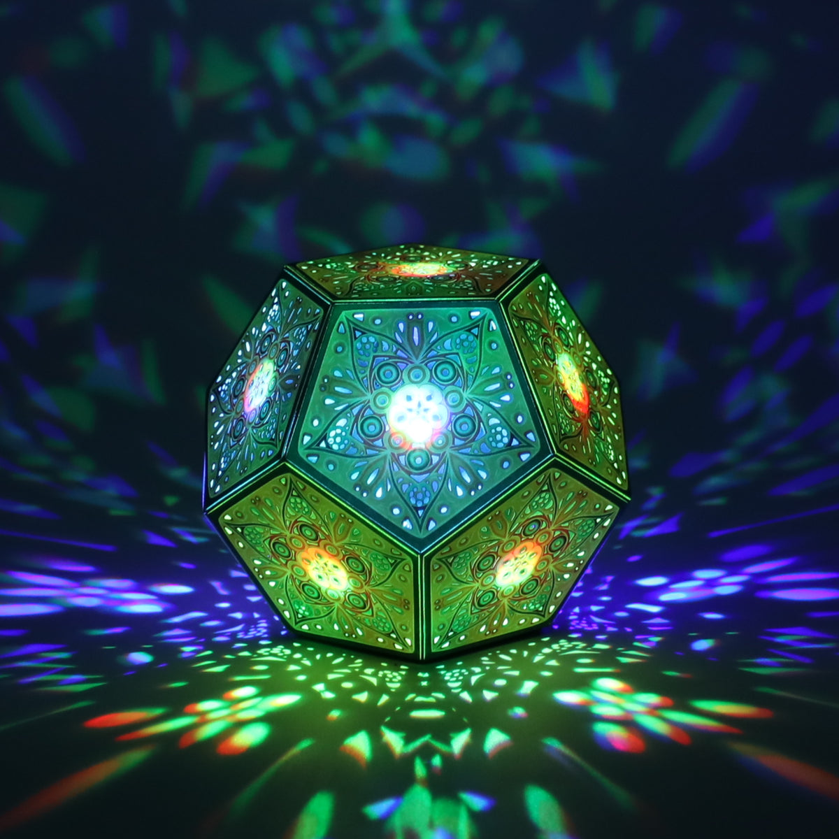 MikhaLuma Phronesis dodecahedron lantern in Shadow Caster style, casting geometric light patterns across a dark room
