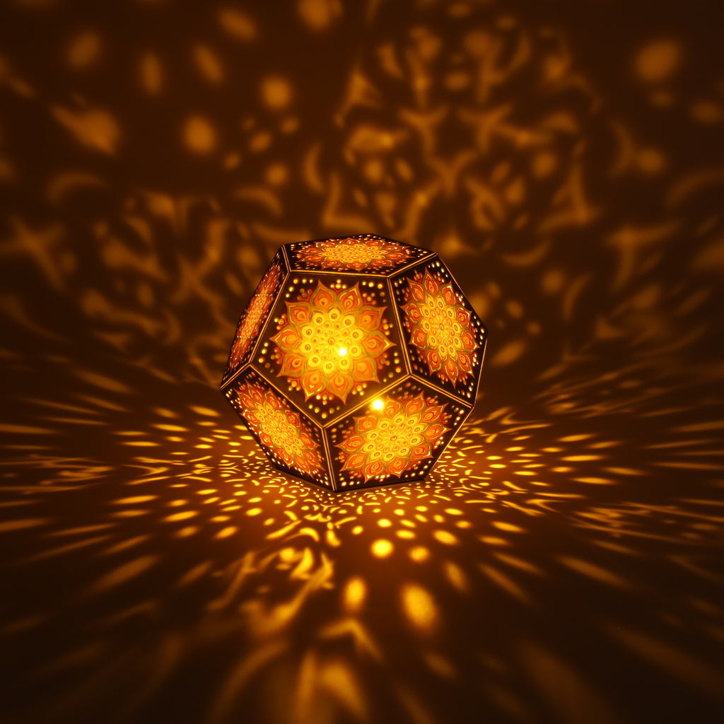 MikhaLuma Oneiros dodecahedron lantern in Amber style, lit with a warm amber tone