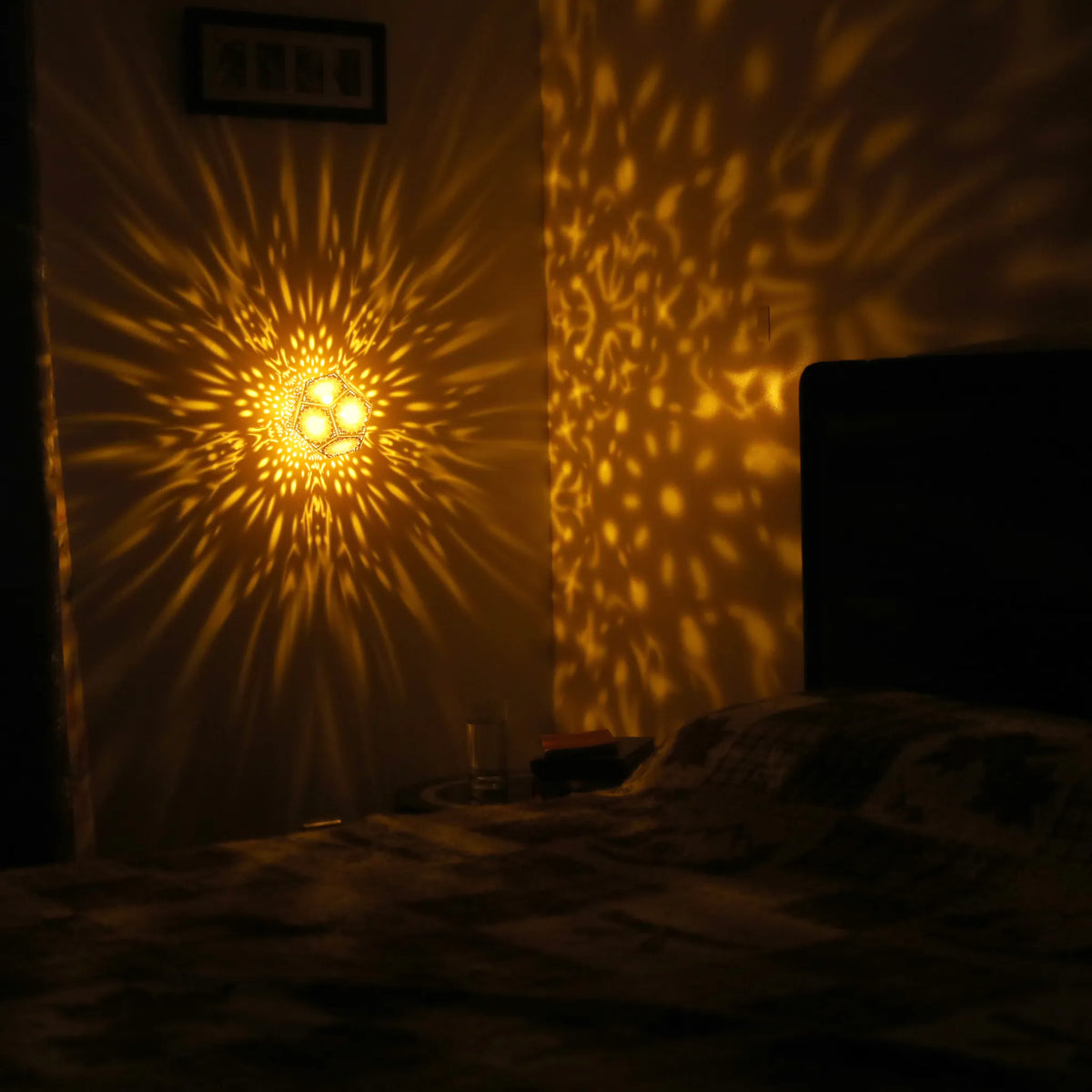 MikhaLuma Oneiros dodecahedron lantern in Amber style, warm amber light wrapping a wall corner