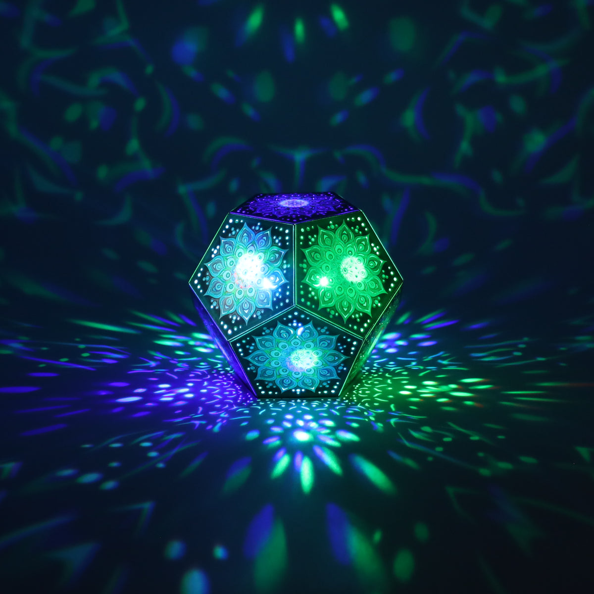 MikhaLuma Oneiros dodecahedron lantern in Shadow Caster style, casting geometric light patterns across a dark room