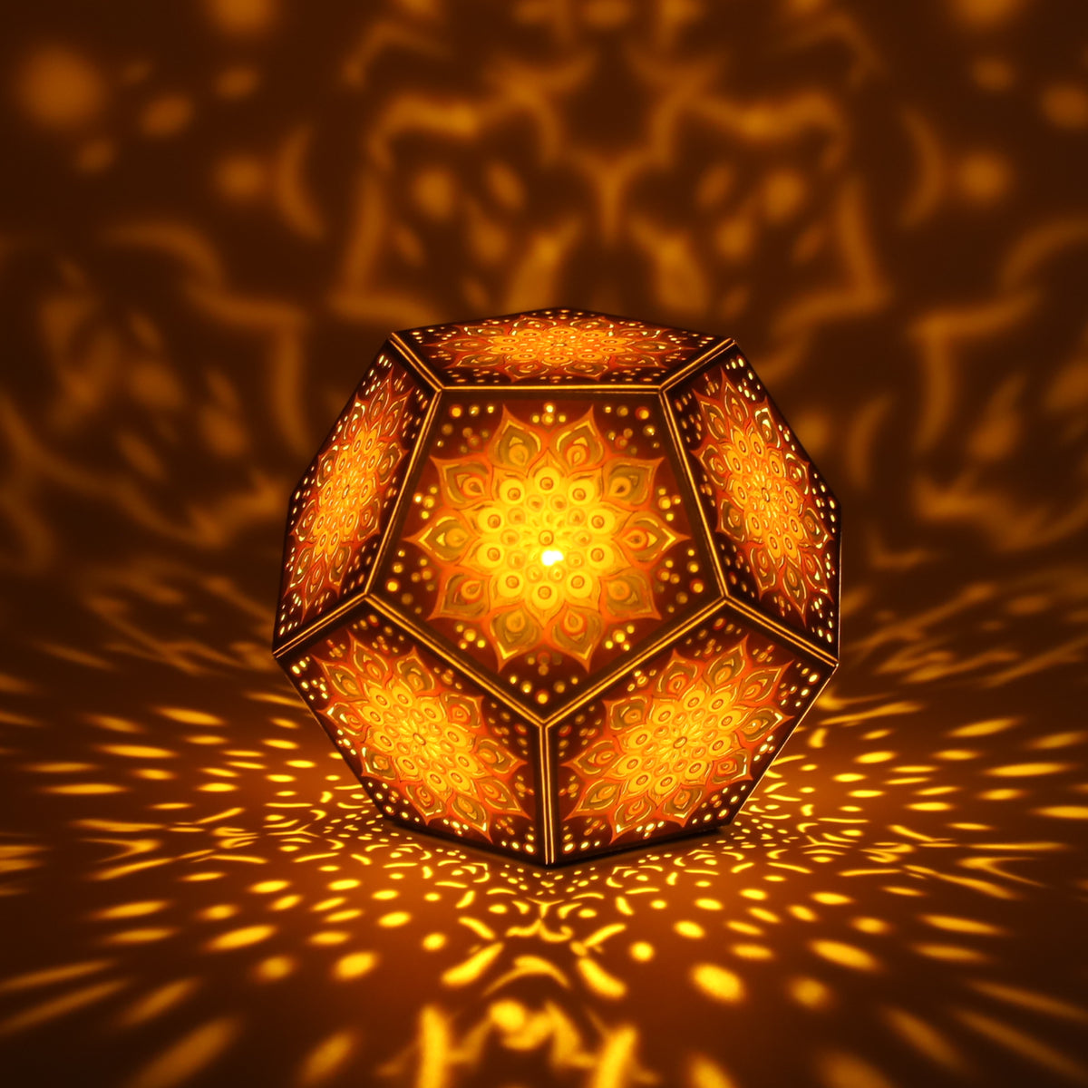 MikhaLuma Sophia dodecahedron lantern in Amber style, lit with a warm amber tone