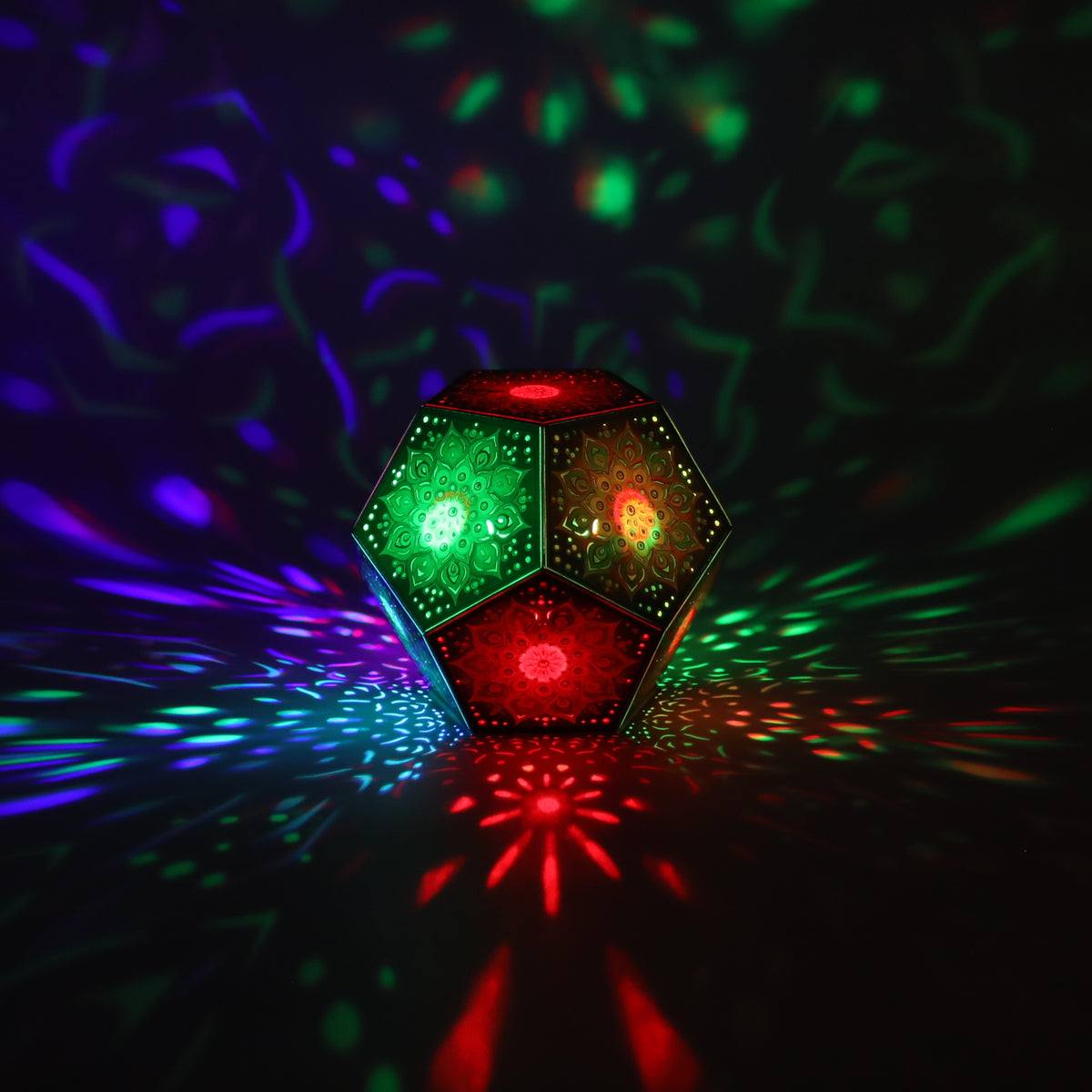 MikhaLuma Sophia dodecahedron lantern in Shadow Caster style, casting geometric light patterns across a dark room