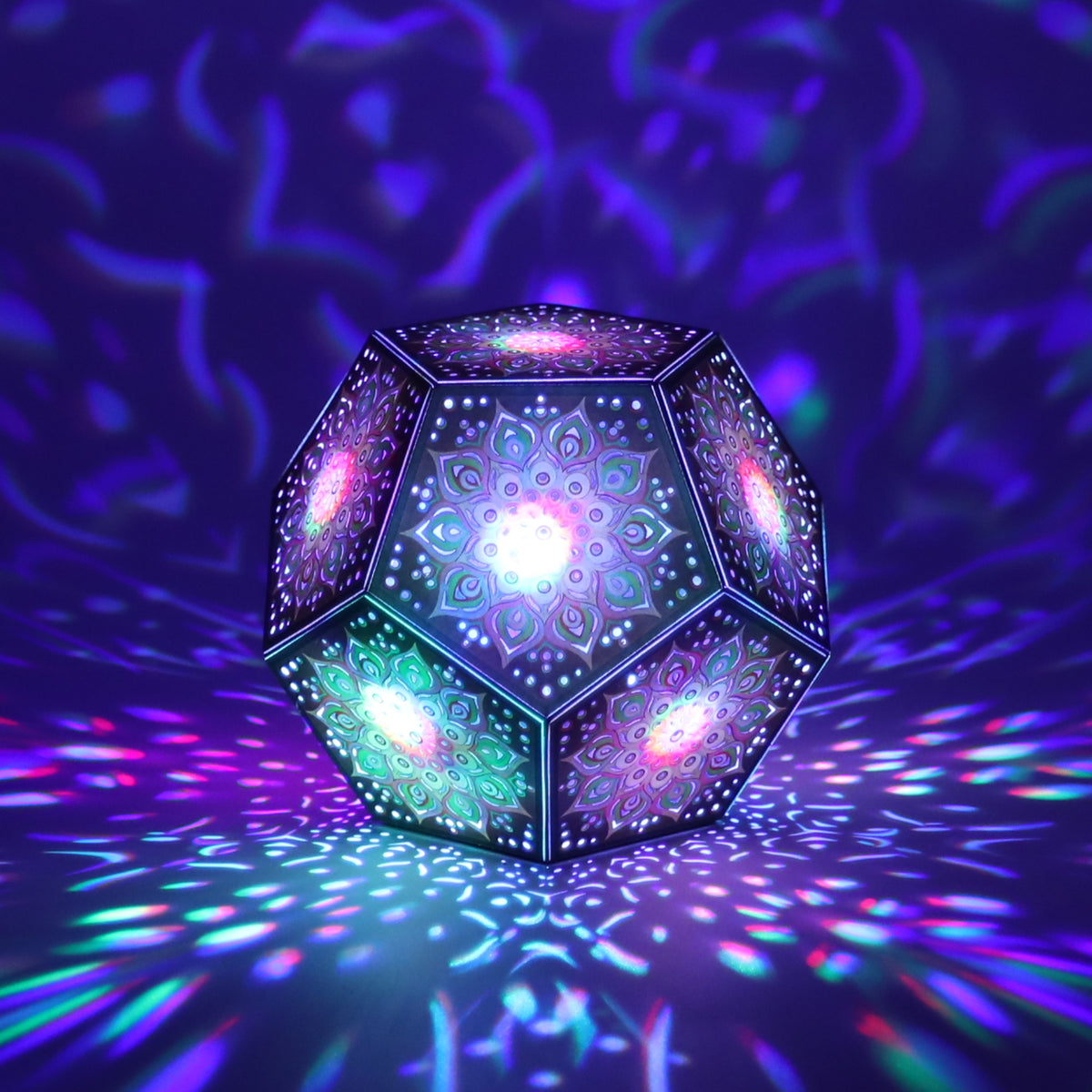MikhaLuma Sophia dodecahedron lantern in Shadow Caster style, casting geometric light patterns across a dark room