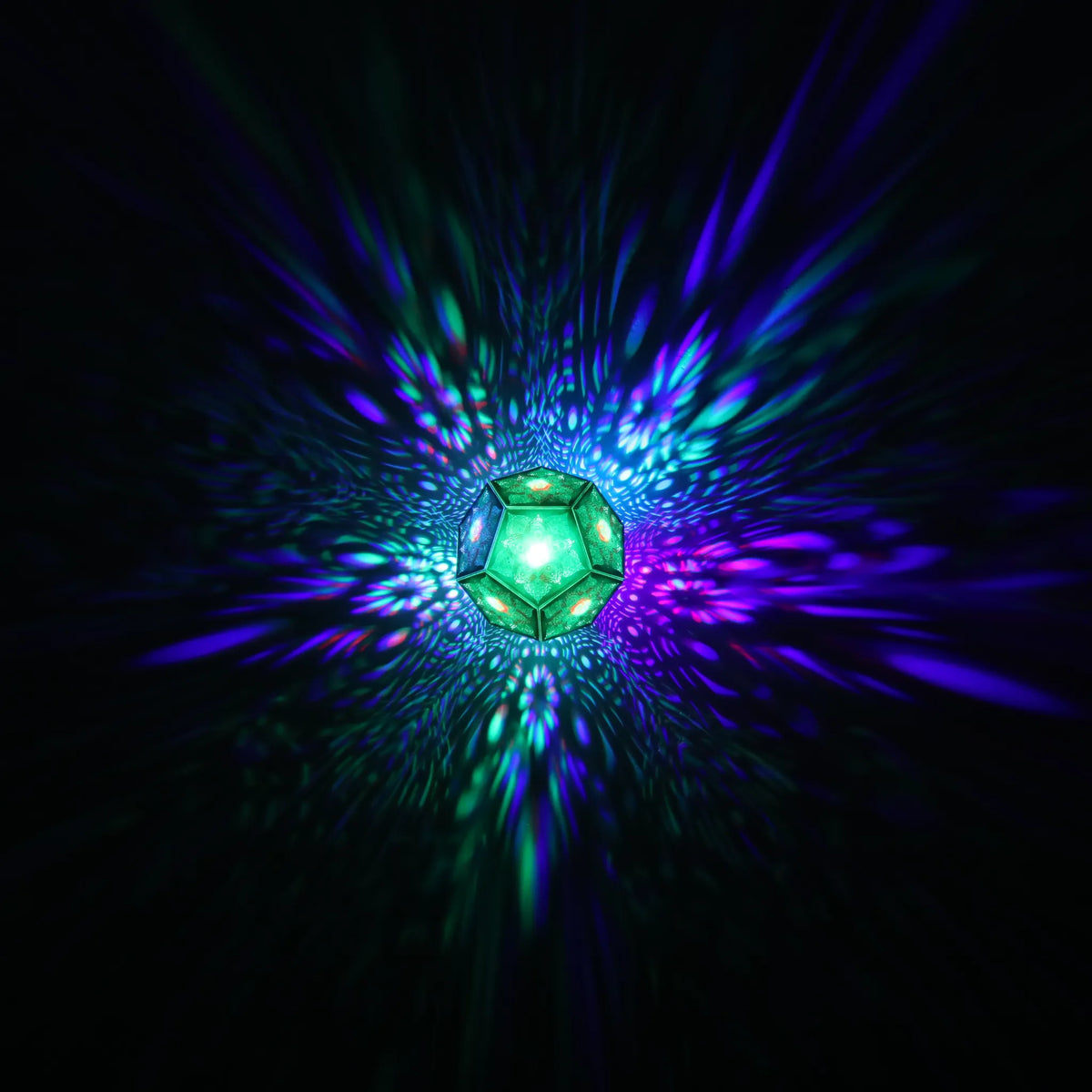 MikhaLuma Eros dodecahedron lantern in Shadow Caster style, geometric pattern projected across a wall