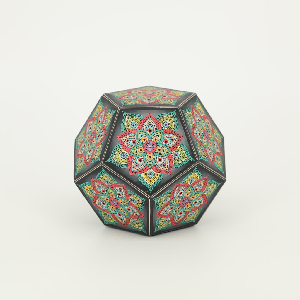 MikhaLuma Eros handcrafted dodecahedron paper lantern, unlit in daylight