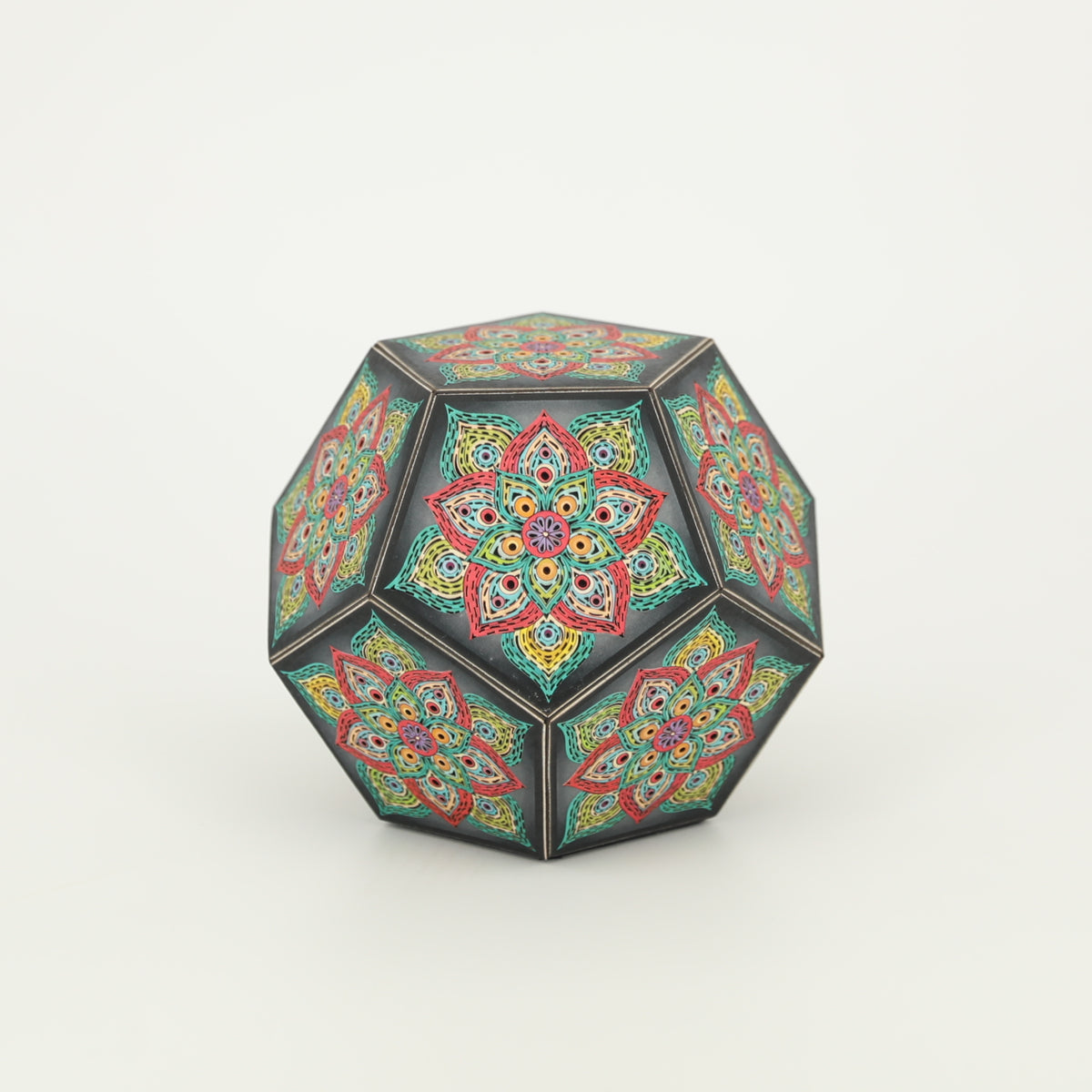 MikhaLuma Eros handcrafted dodecahedron paper lantern, unlit in daylight