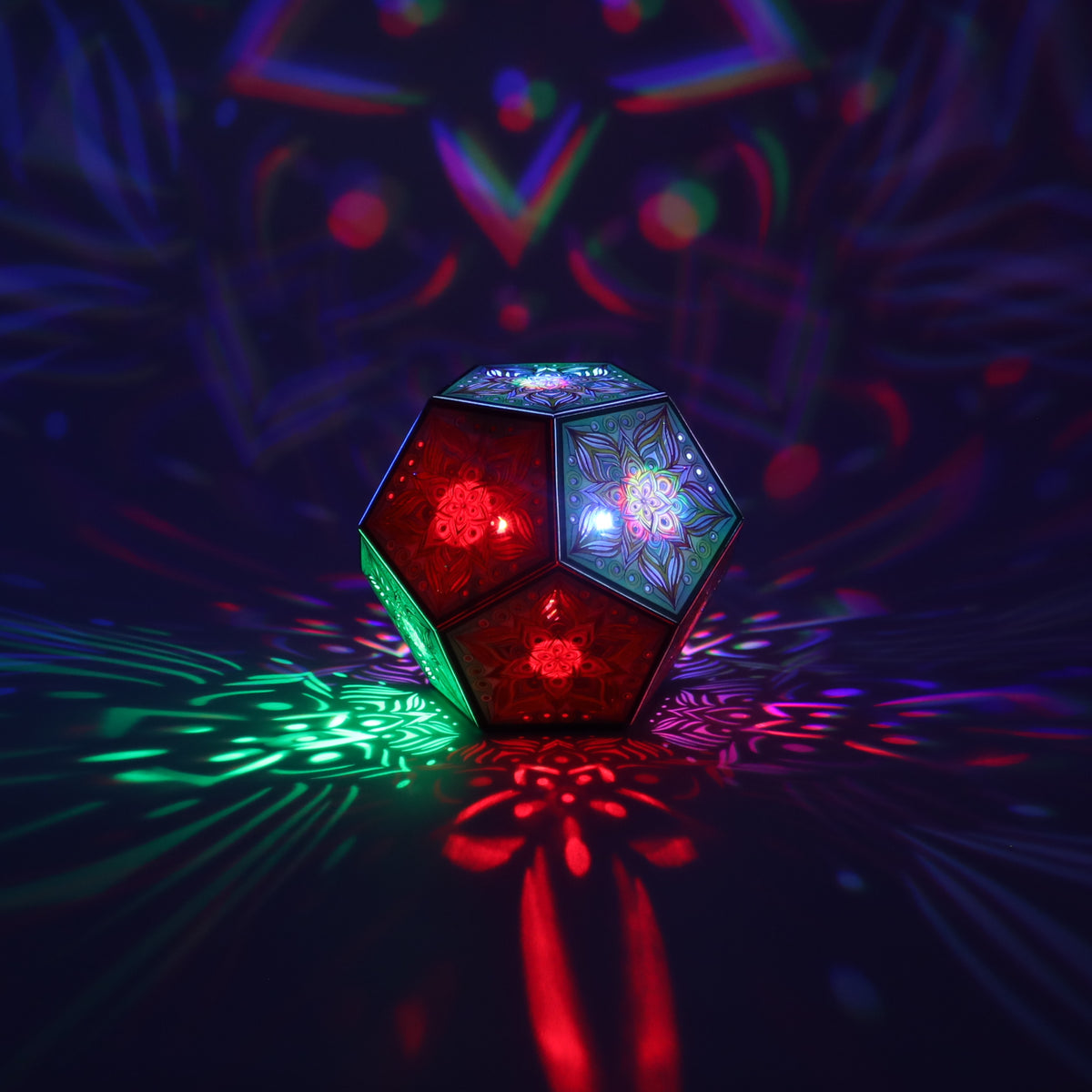 MikhaLuma Metanoia dodecahedron lantern in Shadow Caster style, casting geometric light patterns across a dark room