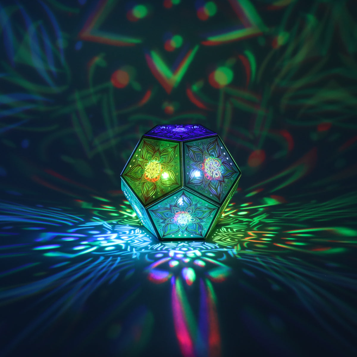 MikhaLuma Metanoia dodecahedron lantern in Shadow Caster style, casting geometric light patterns across a dark room