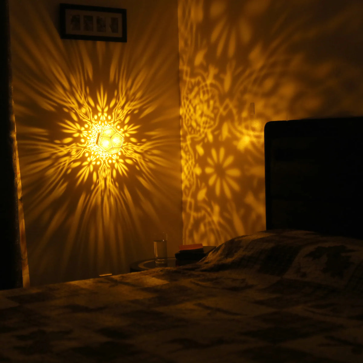 MikhaLuma Agape dodecahedron lantern in Amber style, warm amber light wrapping a wall corner
