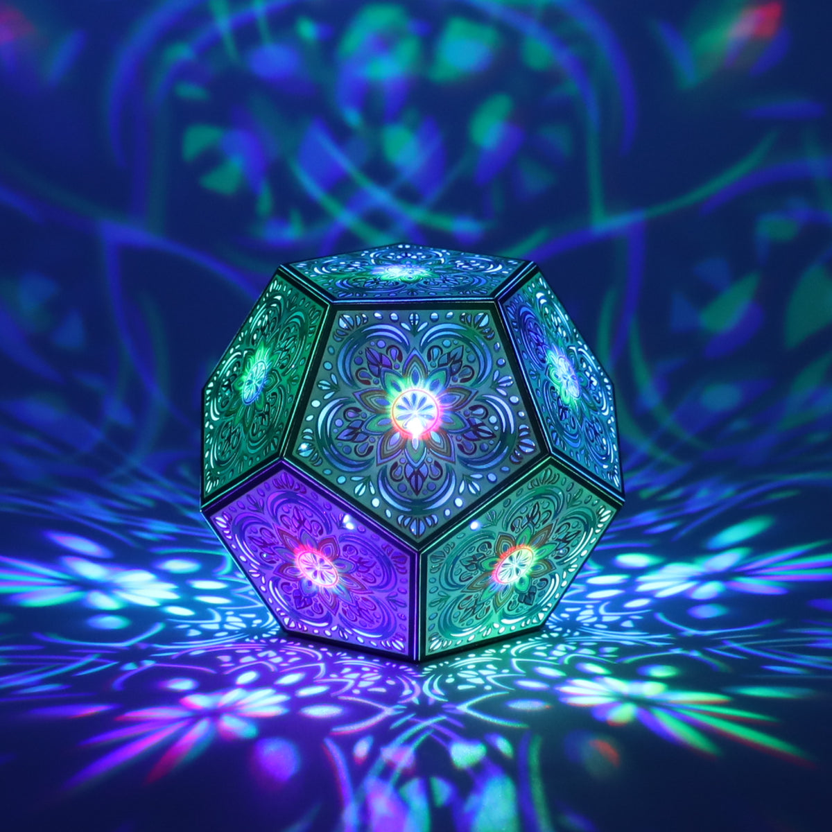 MikhaLuma Agape dodecahedron lantern in Shadow Caster style, casting geometric light patterns across a dark room